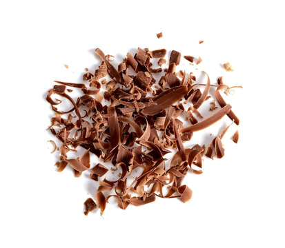 grated chocolate on white background.