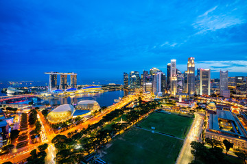 Fototapeta premium Aerial view of the Singapore landmark financial business district at twilight sunset scene with skyscraper and beautiful sky. Singapore downtown