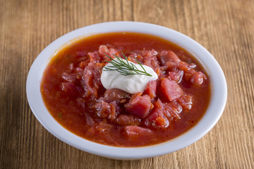 Vegetable soup - red borsch, closeup. Healthy beetroot soup, vegetarian food. Ukrainian and russian national food - red beet soup, borscht