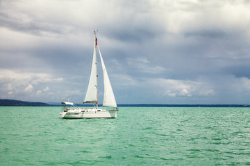 Sailing yacht in the turquoise sea, beautiful landscape