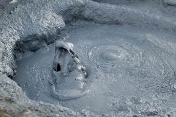 Mud fumaroles. When a mud bubble bursts, abstract shapes form