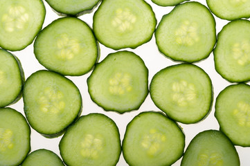 Fresh cucumber slices isolated