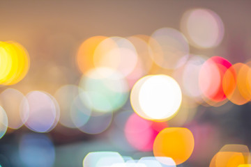 Defocus city light bokeh in the dark for abstract backdrop background texture