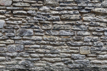 Old Rough Stone Wall Background. Stonework Texture.