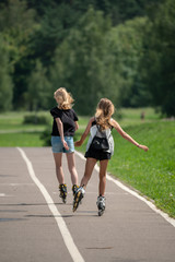 girl roller skate in park
