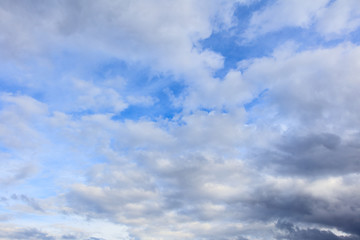 Clouds on a blue sky as a background