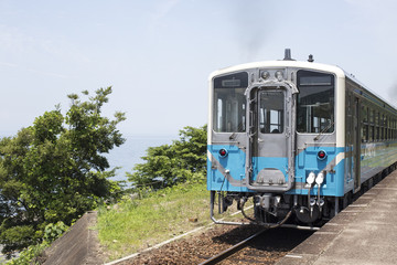 A local train arriving at a small station