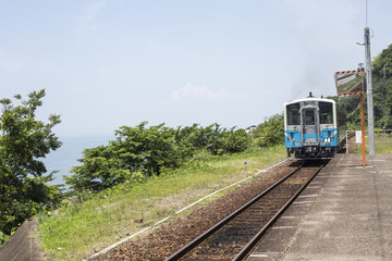 A local train arriving at a small station