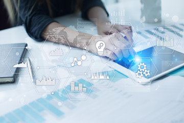 Applications icons and graphs on virtual screen. Business, internet and technology concept.