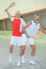 Fototapeta premium men playing pala