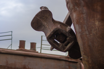 Close up old rusty anchor on old abandoned rusty ship