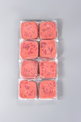 Sliced smoked ham isolated on gray background