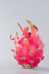 Dragon fruit, pitaya isolated on gray background