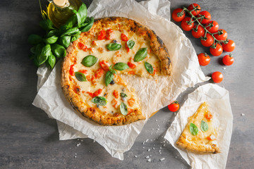 Delicious pizza Margherita on grey background
