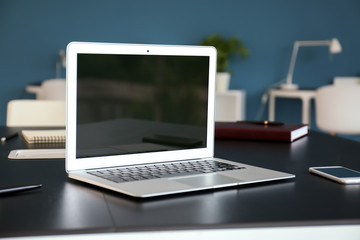 Fototapeta premium Modern laptop on table in office