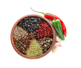 Bowl with different dry spices on white background