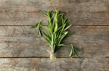 Fresh rosemary on wooden background