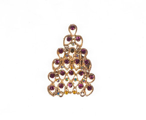 golden brooch with stones on white isolated background