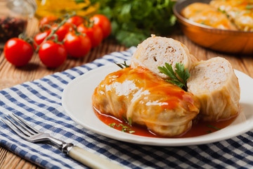 Traditional stuffed cabbage with minced meat and rice, served in a tomato sauce.