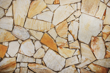 Stone wall. Fragments of masonry. Natural background.