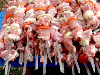 Cooking meat fresh meat barbecue on open wood coal fire