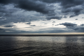 sea landscape, gloomy sky and calm sea