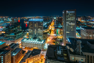 Fototapeta na wymiar View of Downtown at night, in Baltimore, Maryland