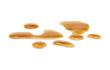 Spilled beer puddle isolated on white background and texture, clipping path