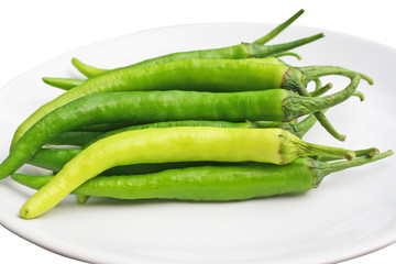 Fresh big green chilli  in plate isolated on white background