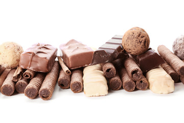 Delicious chocolate with cinnamon on  white background