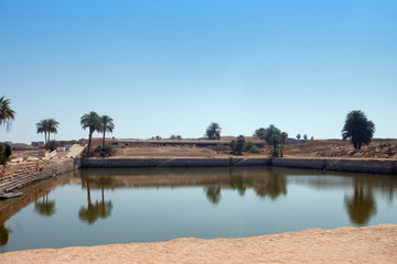 Fototapeta na wymiar Sacred lake on the territory of Karnak temple in Egypt