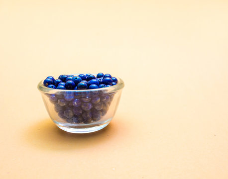natural lapis lazuli in Glass cup on  background