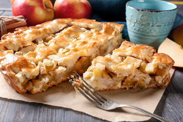Tasty homemade apple pie on parchment