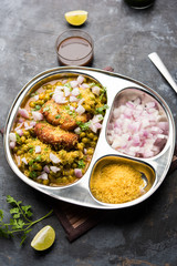 Ragda Pattice is a popular Street food or chat made of potato Patties. served in a steel plate, bowl or ceramic plate with tamarind and cilantro chutney