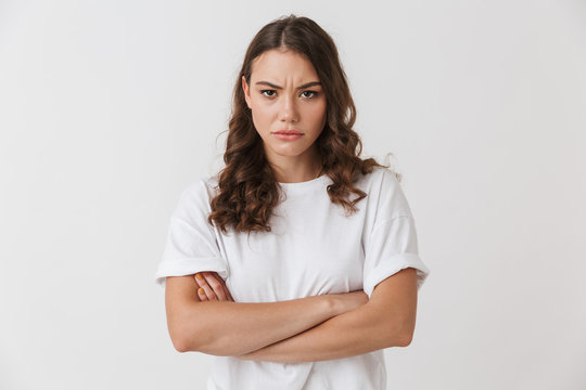 Portrait of an upset young casual brunette woman