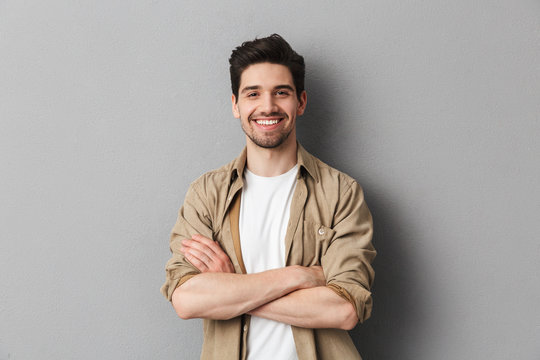 Portrait of a happy young casual man standing