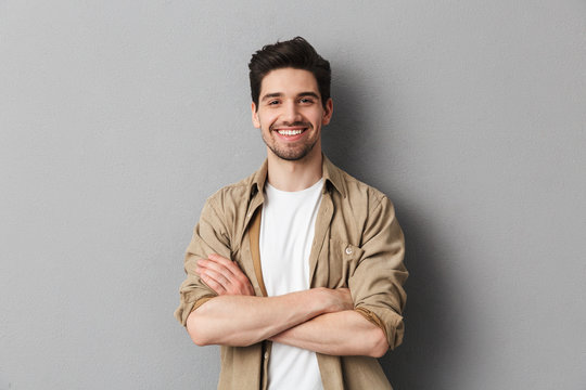 Portrait Of A Happy Young Casual Man Standing