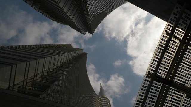 milan city day time famous modern block buildings slow motion up view 4k italy
