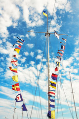 Set of Marine signal flags on a mast.