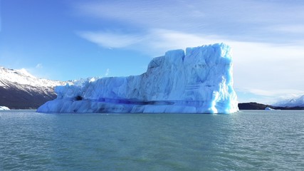 Fototapeta na wymiar Iceberg or ice mountain is a large piece of freshwater ice that has broken off a glacier or an ice shelf and is floating freely in open water