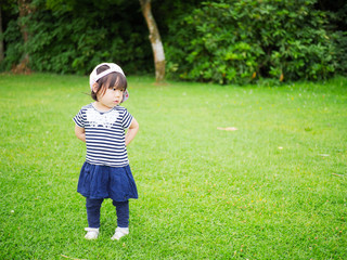baby girl play at Summer forest park
