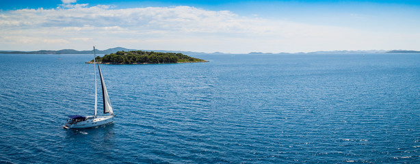 Sailing boat on open water, aerial view