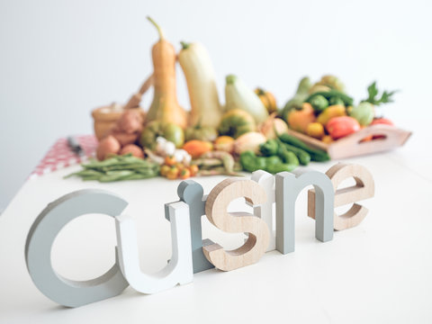 Set of vegetables with cuisine inscription