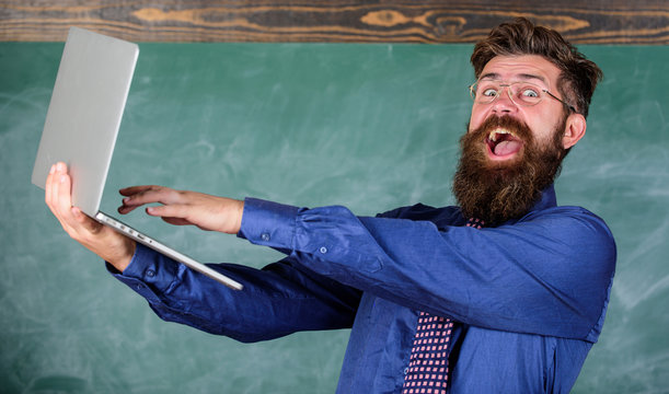 Successful Examination. Teacher Bearded Happy Man With Modern Laptop Passed Test Online Chalkboard Background. Hipster Teacher Eyeglasses Hold Laptop Passed Distance Knowledge Check. Pass Test Online