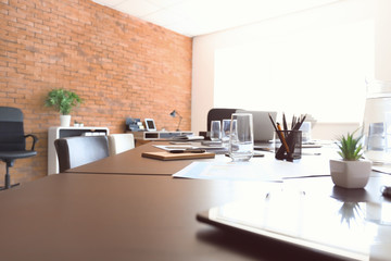 Table prepared for business meeting in conference hall