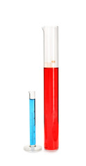 Laboratory glassware with color liquids on white background