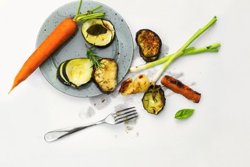 Food arrangement with roasted and raw vegetable.