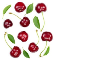 Sweet red cherries isolated on white background with copy space for your text. Top view. Flat lay pattern