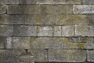 wall of old brick of different shapes