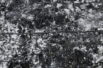 Abstract burn background. Black coal with sparkles